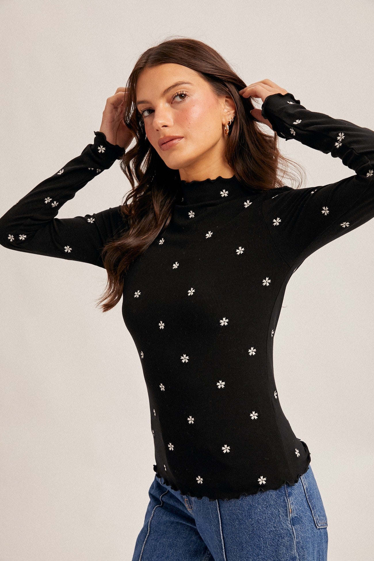 FLOWER EMBROIDERED MOCK NECK CABBAGE HEM TOP