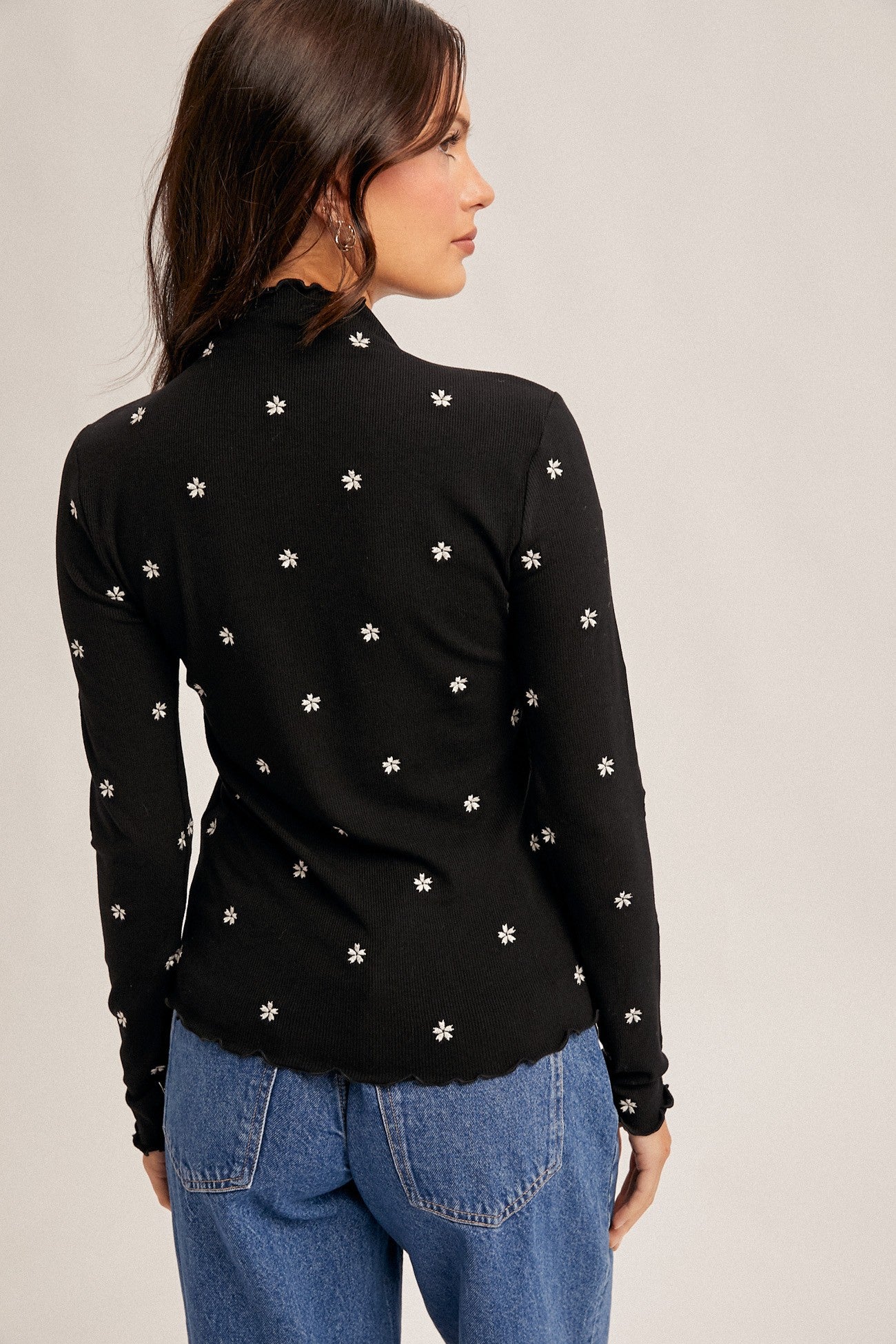 FLOWER EMBROIDERED MOCK NECK CABBAGE HEM TOP