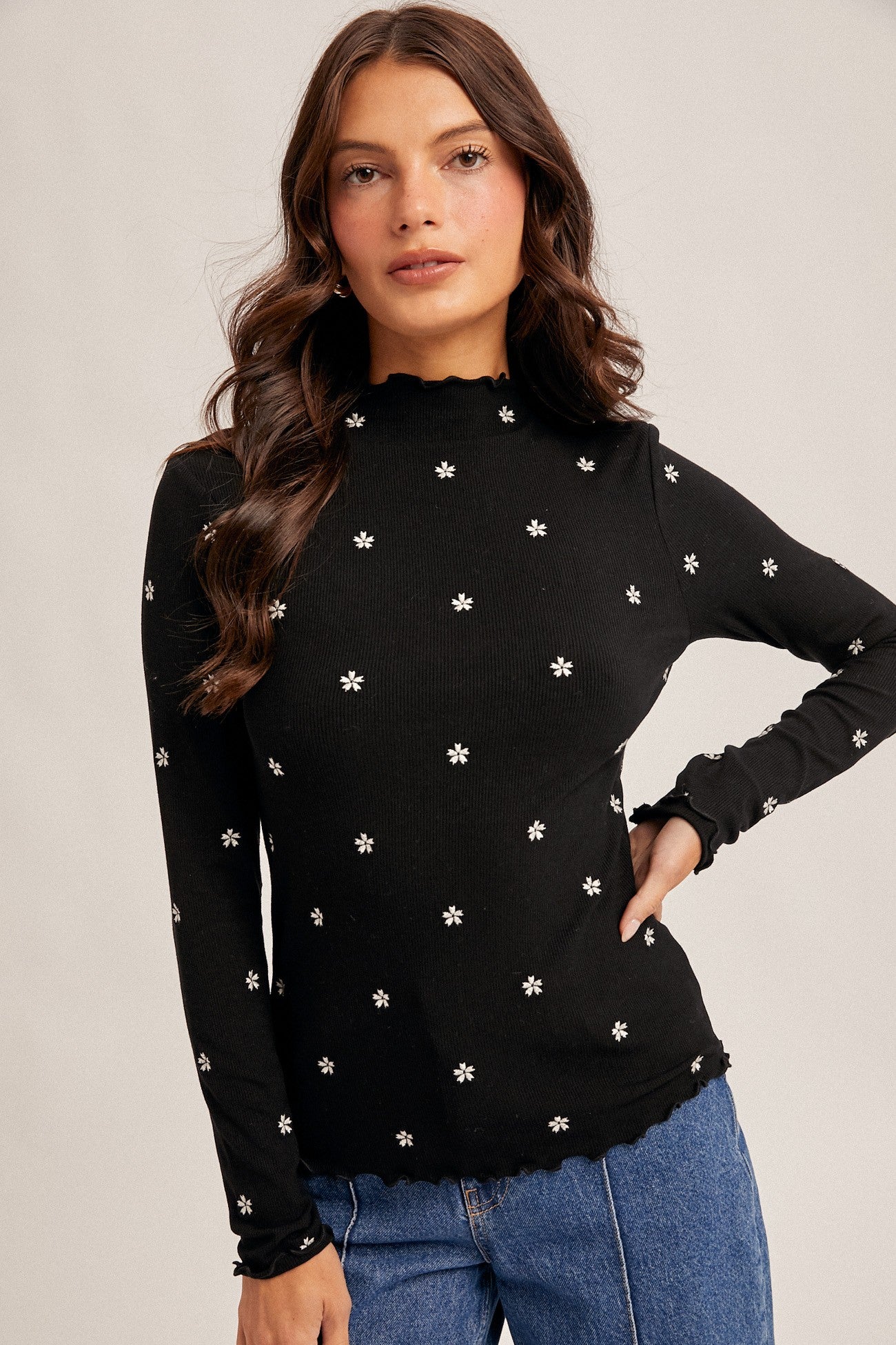 FLOWER EMBROIDERED MOCK NECK CABBAGE HEM TOP