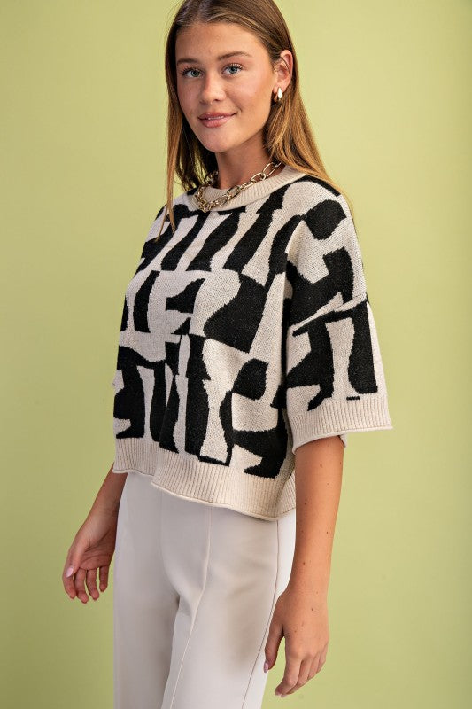 THE GEOMETRIC SHORT SLEEVE SWEATER TOP