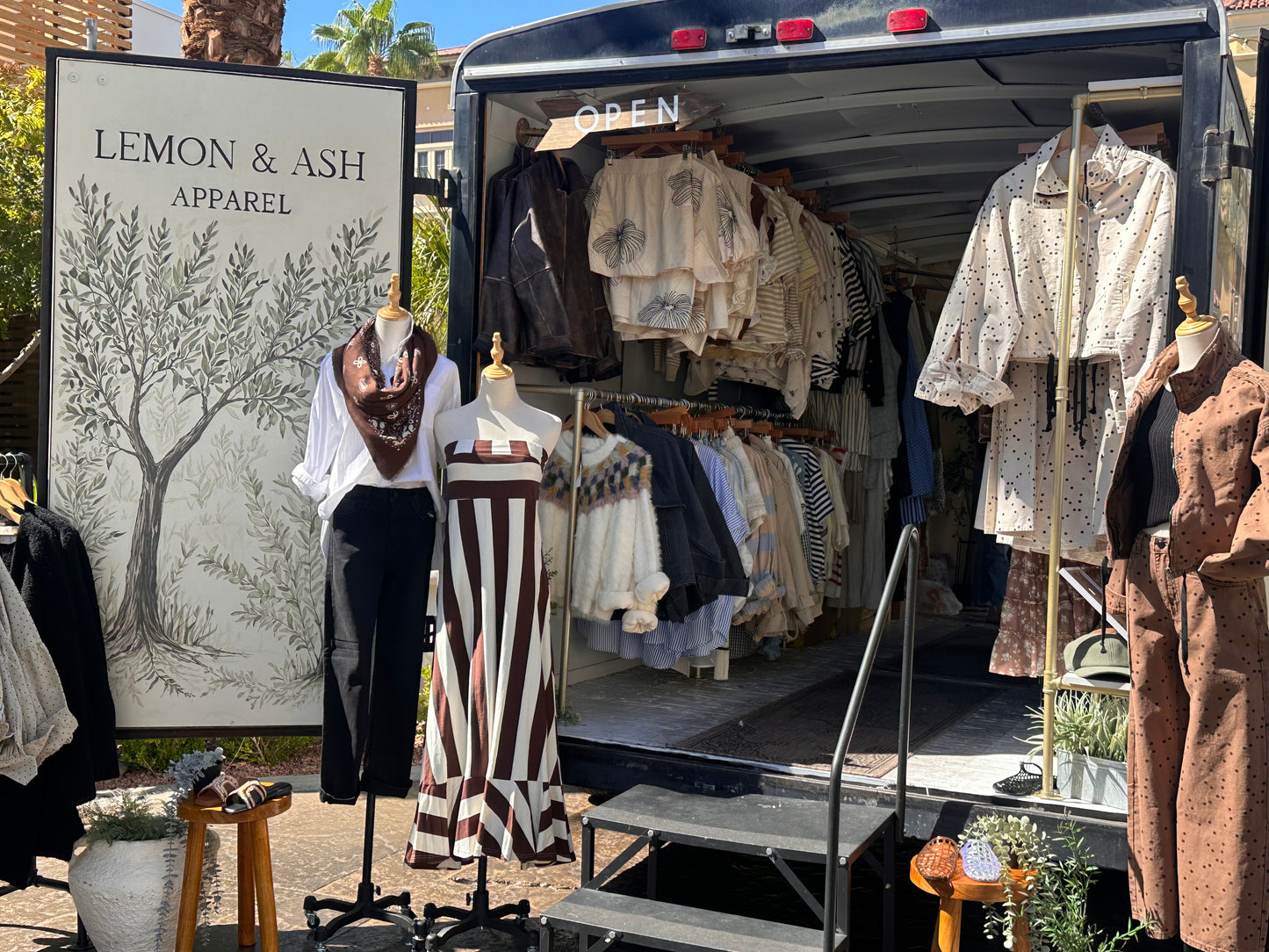 Lemon & Ash Apparel mobile boutique trailer set up for shopping in Las Vegas.